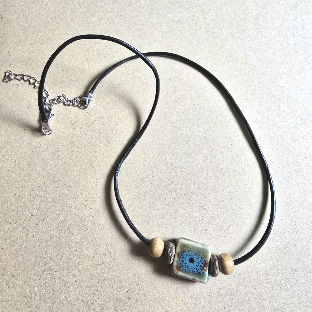 Handcrafted Black and Blue Pendant Necklace